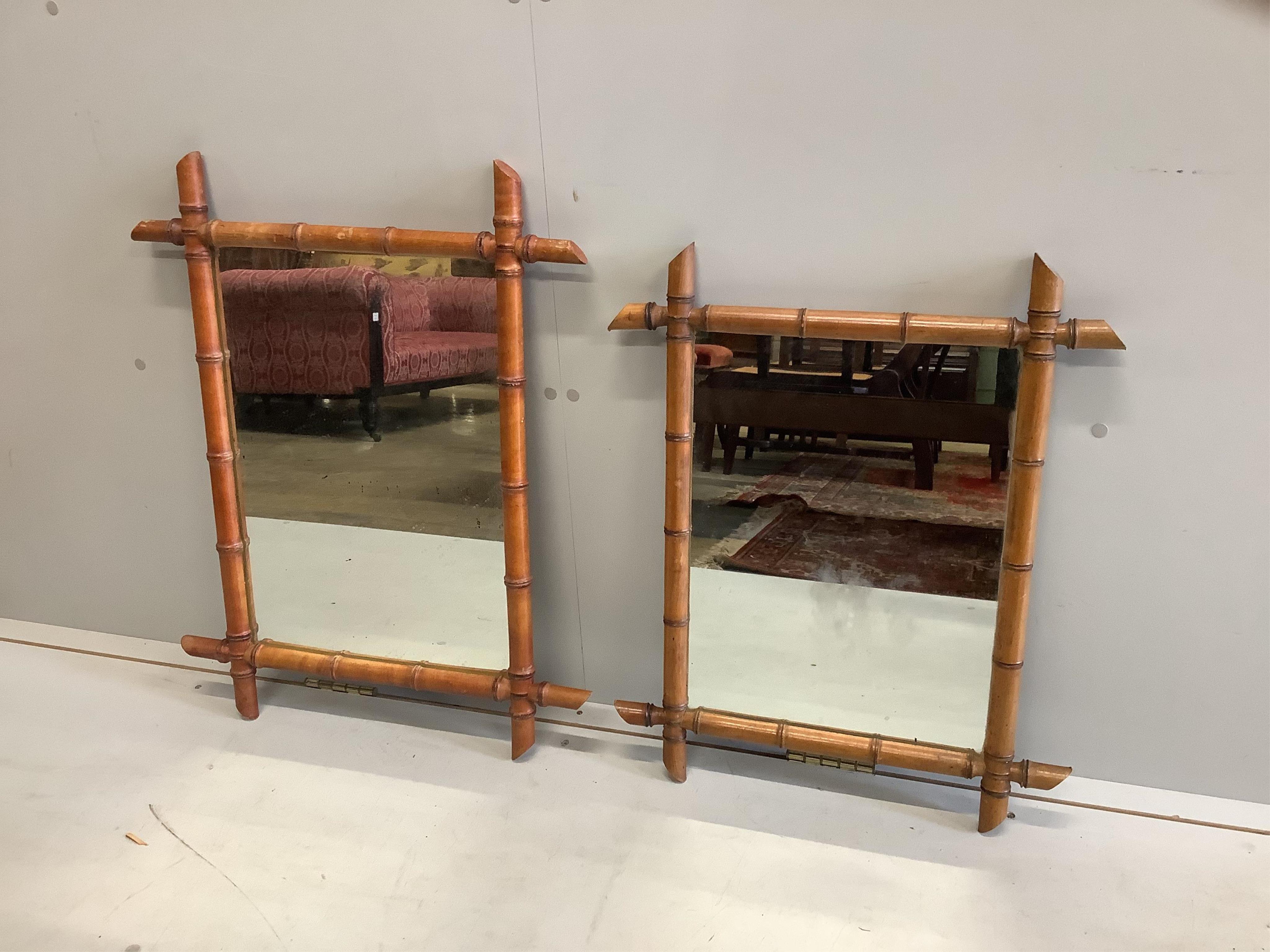 Two late 19th century French rectangular simulated bamboo wall mirrors, larger width 73cm, height 57cm. Condition - fair